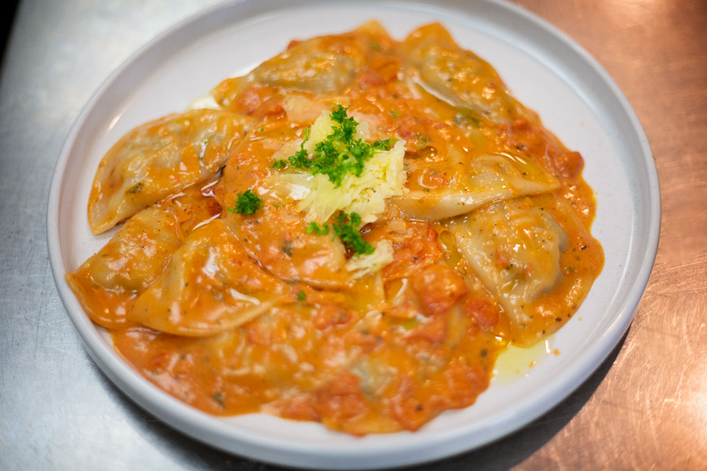 Our hand made ravioli with ricotta, mixed meat, spinach and cheese.